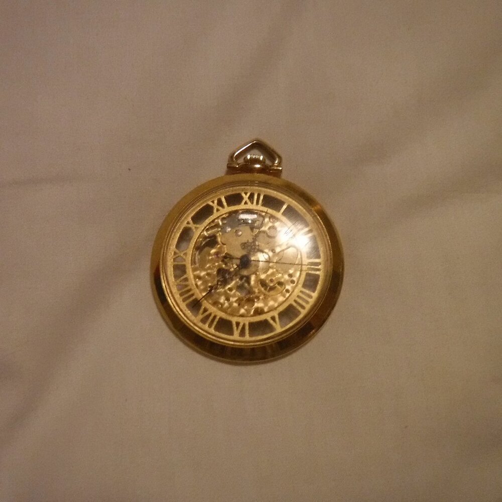 Antique Colibri gold skeleton pocket watch